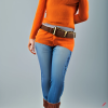 craiyon_134633_Stunningly_beautiful_woman_with_brown_hair__orange_sweater__blue_jeans__brown_belt__H.png
