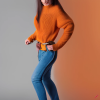 craiyon_135009_Full_body_shot_of_a_stunningly_beautiful_woman_with_brown_hair__green_eyes__orange_sw.png