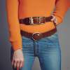 craiyon_135010_Full_body_shot_of_a_stunningly_beautiful_woman_with_brown_hair__green_eyes__orange_sw.png