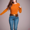 craiyon_135012_Full_body_shot_of_a_stunningly_beautiful_woman_with_brown_hair__green_eyes__orange_sw.png