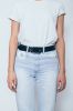 storyblocks-unrecognizable-young-woman-wearing-blanc-white-t-shirt-and-blue-high-waist-moms-jeans-with-belt-standing-over-white-background-close-up_r-ytM6g8X_SB_PM.jpg