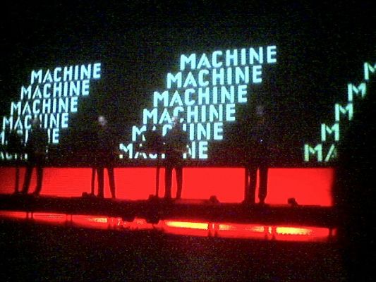 Kraftwerk - The Man Machine
Photo of the band Kraftwerk preforming live.
