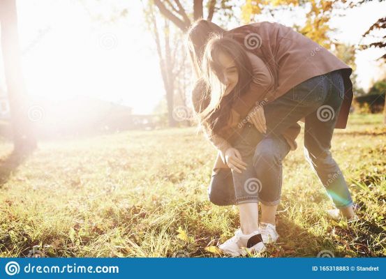 side-profile-young-smiling-brunette-twin-girls-having-fun-wrestling-autumn-sunny-park-blurry-background-side-profile-165318883.jpg
